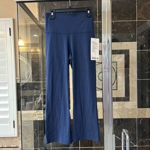 Lululemon blue flare crop, size 6, NWT.
